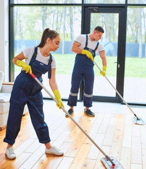 Cleaners cleaning the floor